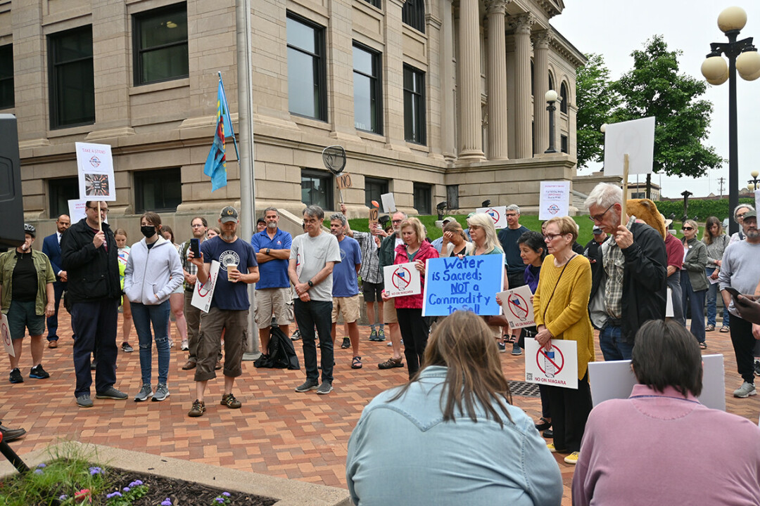 SPEAKING UP. About 40 residents gathered for a rally opposing the pending agreement with Niagara Bottling.