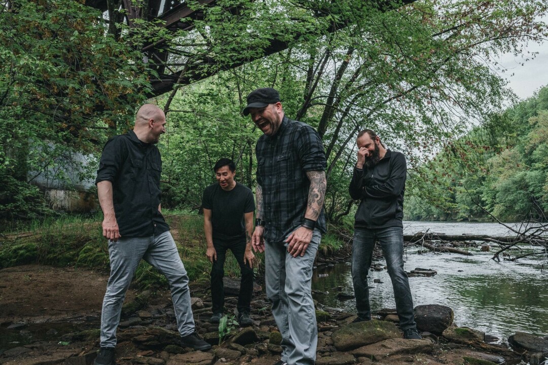 Rick in a photo with bandmates from Ghost of the Sun.