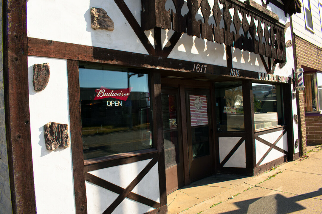 WOULDN'T YOU LIKE TO GET AWAY. The Waiting Room, which is so new it doesn't have a sign, it tucked into a small building next to Jessi J's Barbershop.