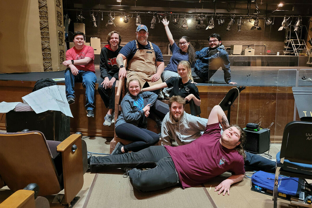 UW-Stout University Theatre Director Audric Buhr, center, with cast and crew members of “Be More Chill.” 