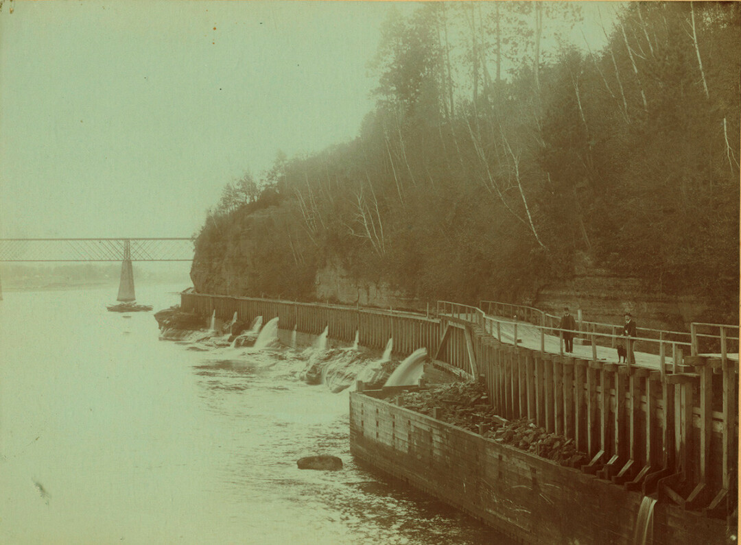 THAT'S NO WALKWAY. It's actually the log flume that once ran from Dells Pond to Half Moon Lake in Eau Claire. 