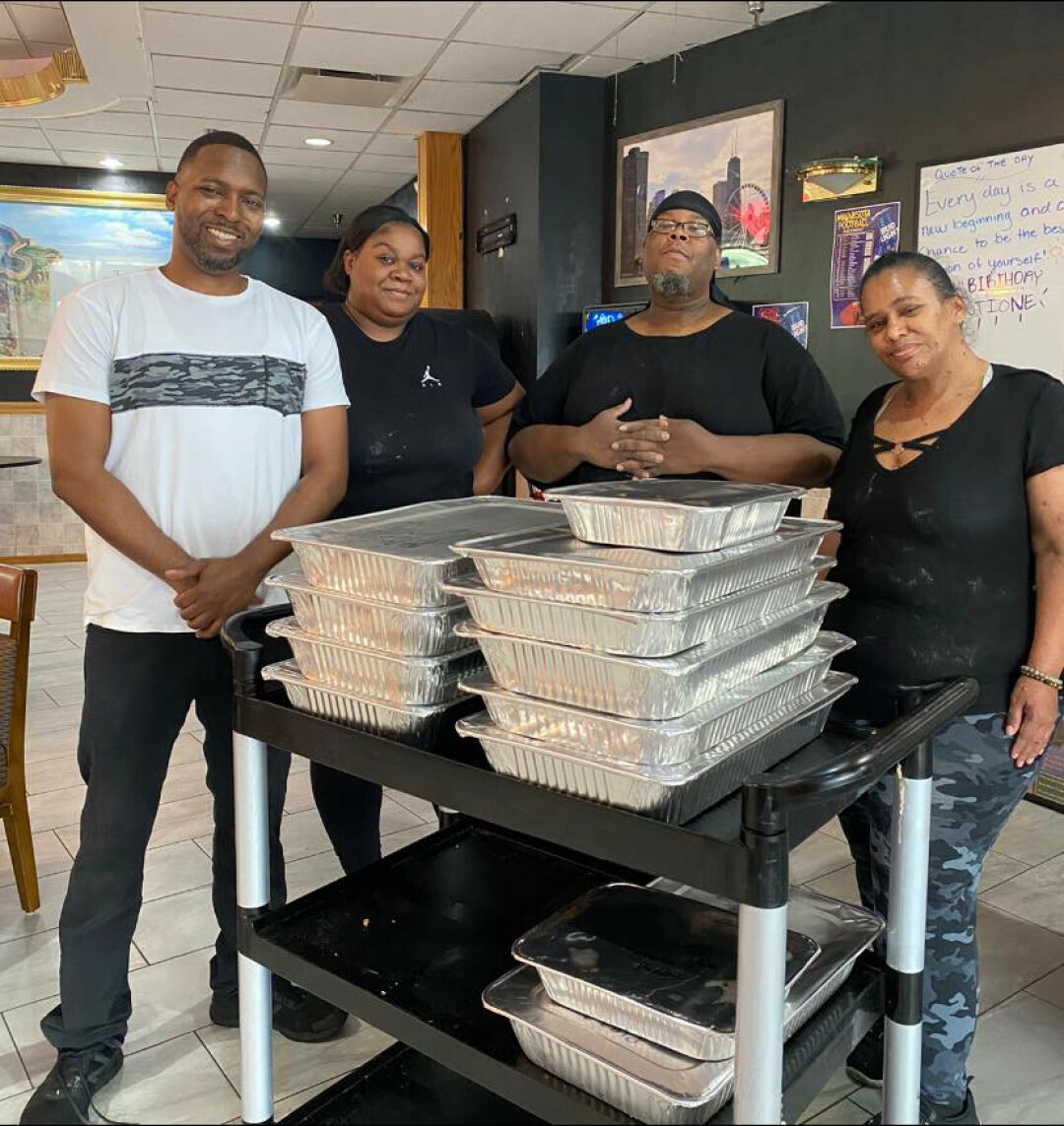 C&T's Soul Food staff pictured with meal donations.