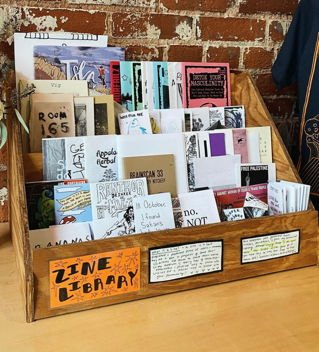 ZINE SCENE. SHIFT Cyclery & Coffee Bar offers a small zine library showcasing local artists. (Photos via Facebook)