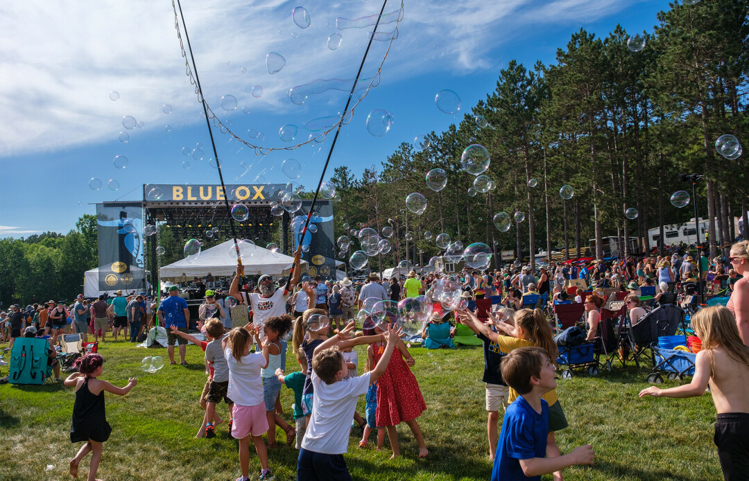 A DECADE OF BLUE OX. This summer will be Blue Ox Music Festival's 10th year, and it's a can't-miss! (Pictured: 2021 Blue Ox vibes. Photo by Mike O'Brien)