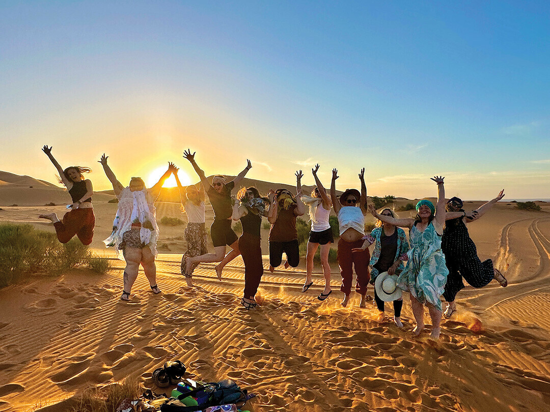 Taking a leap in the Sahara Desert.