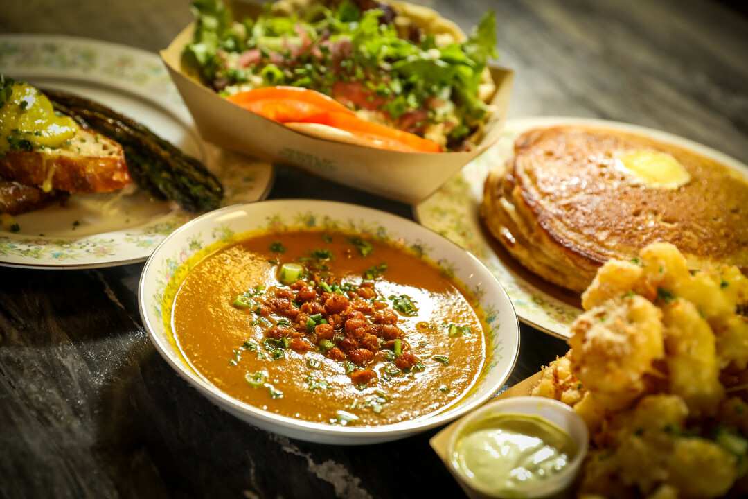 Carrot Coconut Curry pictured at center.