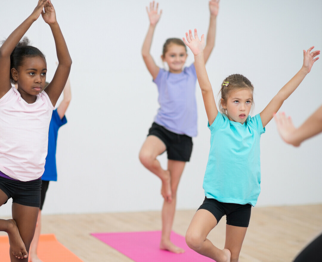 ROLLING WITH THE EAUM-IES. Kids ages 4-9 can learn some yoga techniques with this new summer camp experience. (Photo via Eaum Yoga + Fitness website)