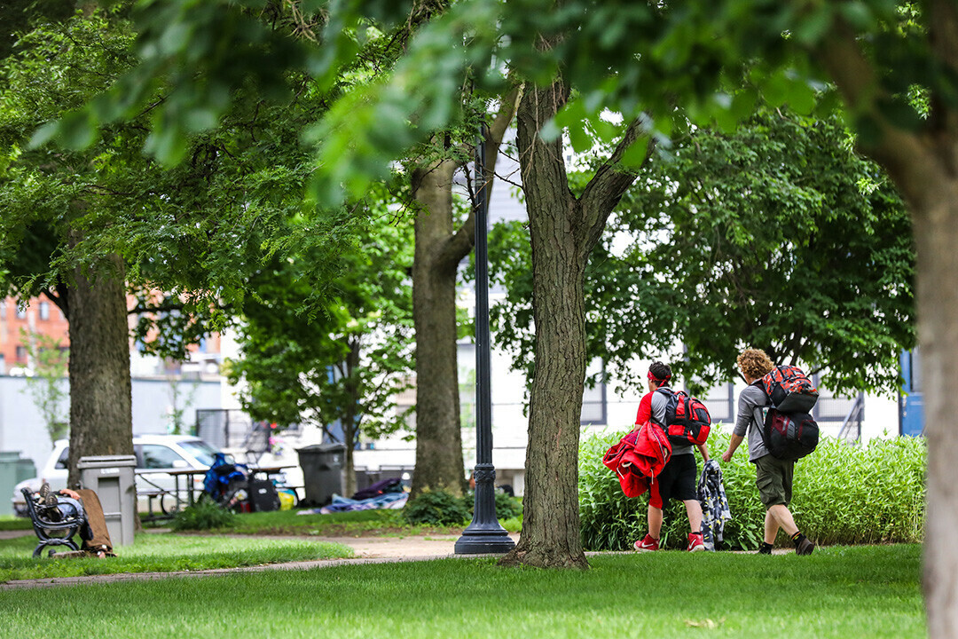 Wilson Park in downtown Eau Claire has become a frequent spot for the growing population of unhoused people. It is also on a list of possible sites for a new day resource center, which would serve the needs of the area's homeless.