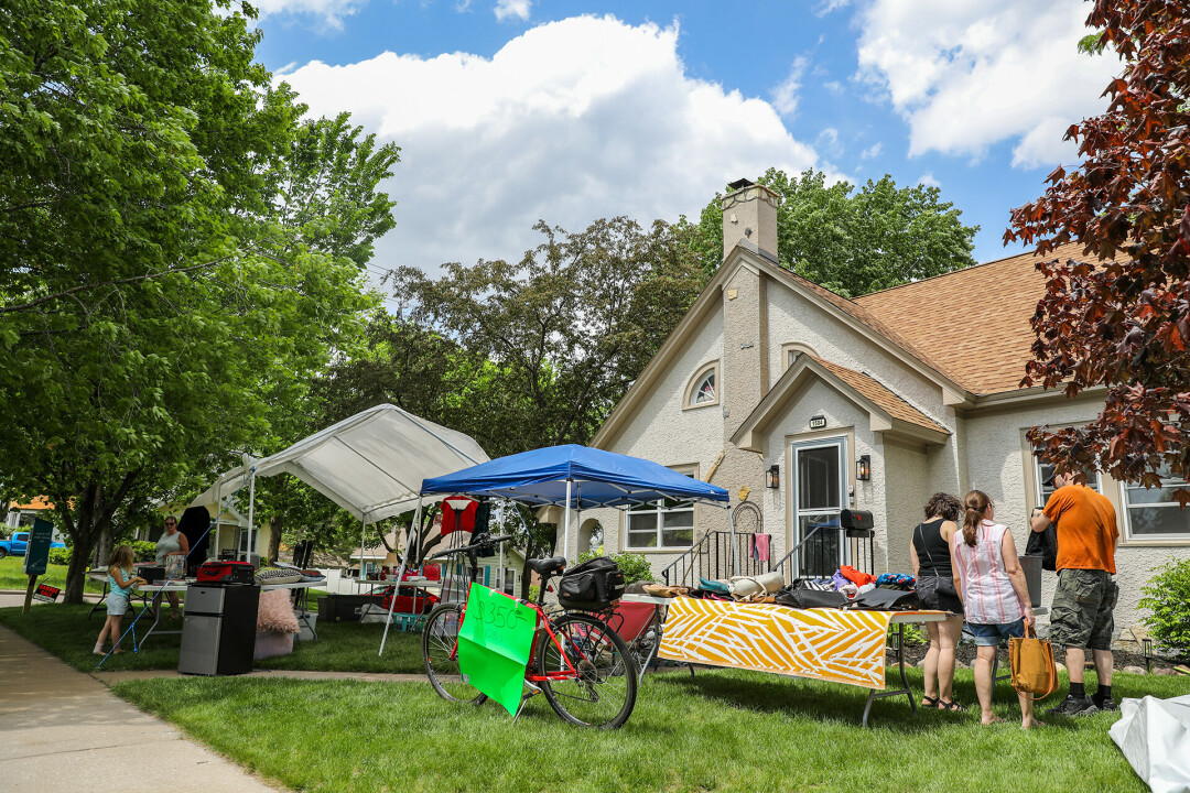 HUNTING FOR A BARGAIN. Local Ron Davis took on one of the greatest tasks of the season: putting on a garage sale. Here's how it went. (Pictured is a sale during this year's East Hill Neighborhood Thrift Sale by Andrea Paulseth)