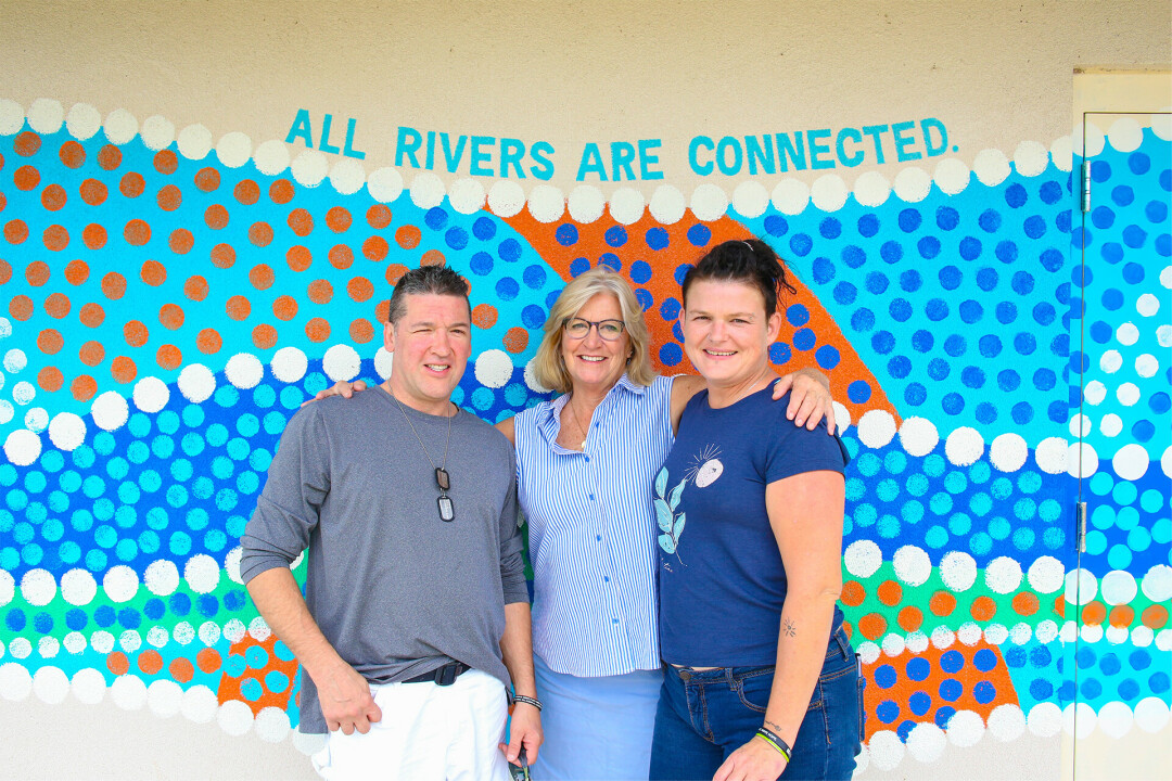 Burke with Justin Danforth, left, and Jessica