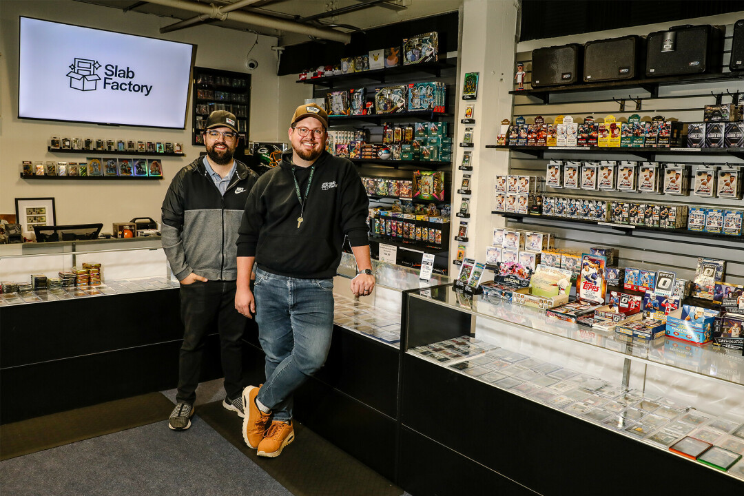 TAKE A SLAB AT IT. Co-owners Jordan Stoll and Tyler Henderson recently opened a storefront at Banbury Place for all things card- and hobby-focused.