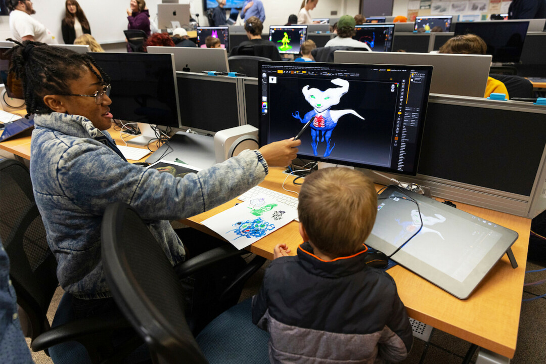 IMAGINE THAT! UW-Stout game design and animation students were able to bring kids' imaginations to life through a recent collaboration. (Pictured: Sade Nagel working with a 4K student. Submitted photos)