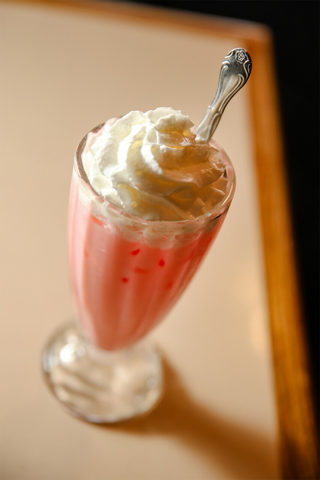 Raspberry Italian Soda with cream.