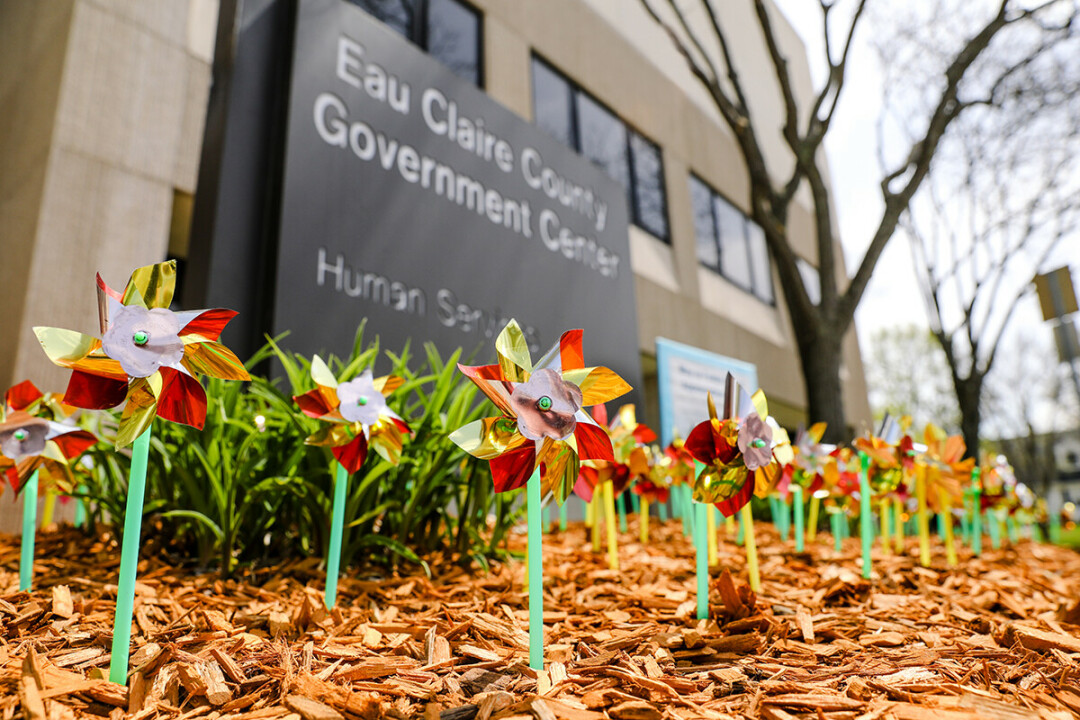 Pinwheels displayed outside the Eau Claire County Human Services Department in May represent the number of local kids in out-of-home foster care.