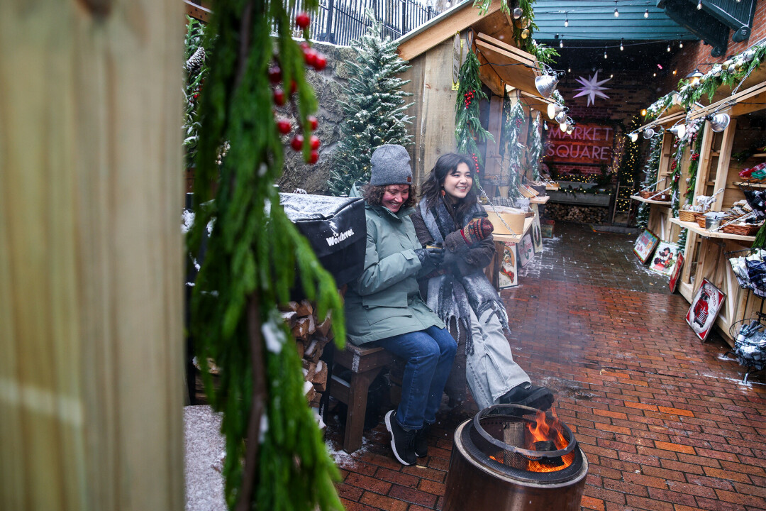 Me, on the right, absolutely cheesing with holiday-induced glee. That's the magic of local businesses turning shopping into an experience; a direct way to support your neighbors.